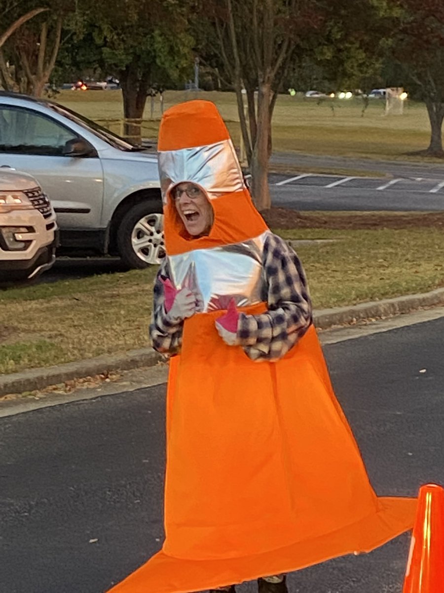 OES_HCS's tweet photo. Educators with a sense of humor! Our Morning Car Team had some fun today directing cars (approximately 450 Colts) as they arrived on campus. What a fun start to the day! #OneTeamOneSpiritOneGoal https://t.co/bZeKqbR068