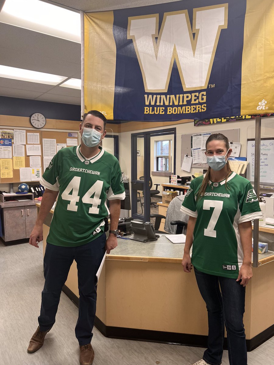Mr. Burgess decided to do some decorating in the office for Jersey day. Don’t worry <a href="/sskroughriders/">Saskatchewan Roughriders</a> I taught the K’s the fight song today. Green is the colour…