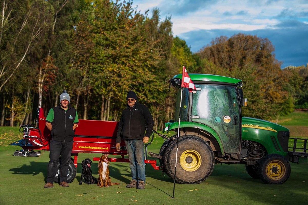 RedeximUK's tweet photo. Andrew Lewis (right) from Arscott Golf Club in Shropshire taking delivery from Matt Lewis of ⁦@CharliesStores⁩ of their new Rink DS800 topdresser. Even our four legged friends look impressed. 
#redexim 
#rink https://t.co/Nm9AiYbBzb