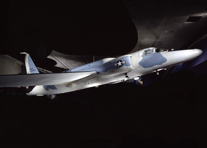 Lockheed U-2 photographed against a black backdrop from a side angle.