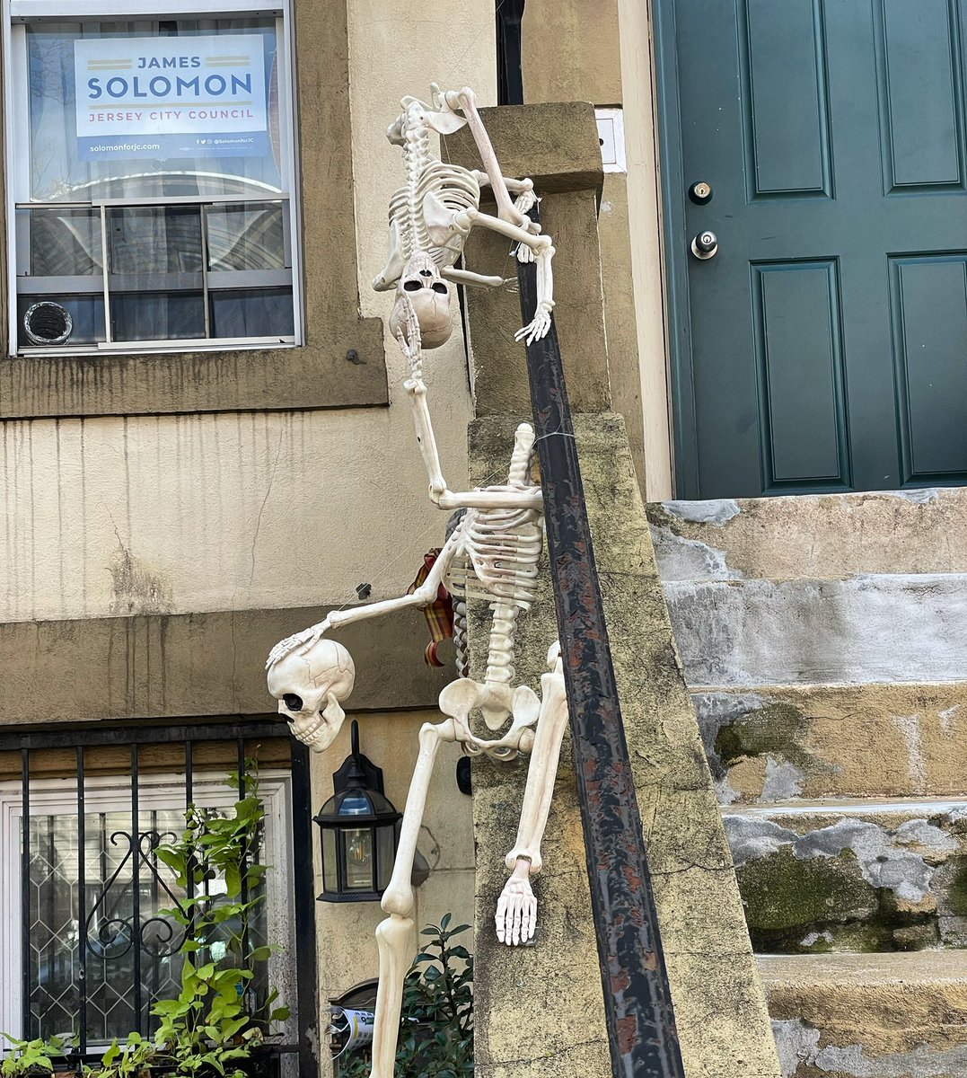 Brizzyc's tweet photo. Love my neighbors’ Halloween decs. Also the @SolomonforJC swag in the window, Jersey City don’t forget to vote! https://t.co/j08Q1r9gnG