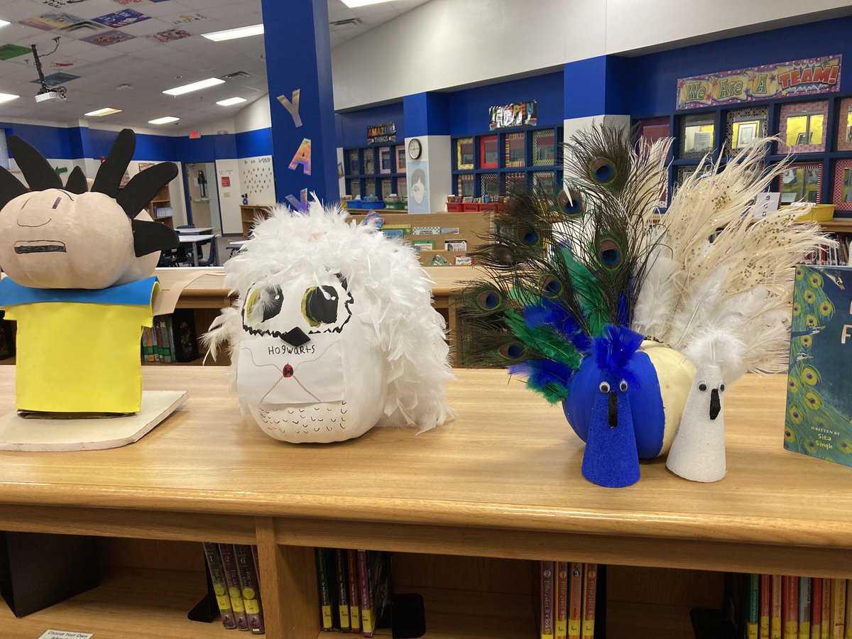 MizDodson's tweet photo. I looooooooove the Book Character Pumpkins that @BluebonnetES students have brought in this month! #lisdlib https://t.co/OwLnTgopMy
