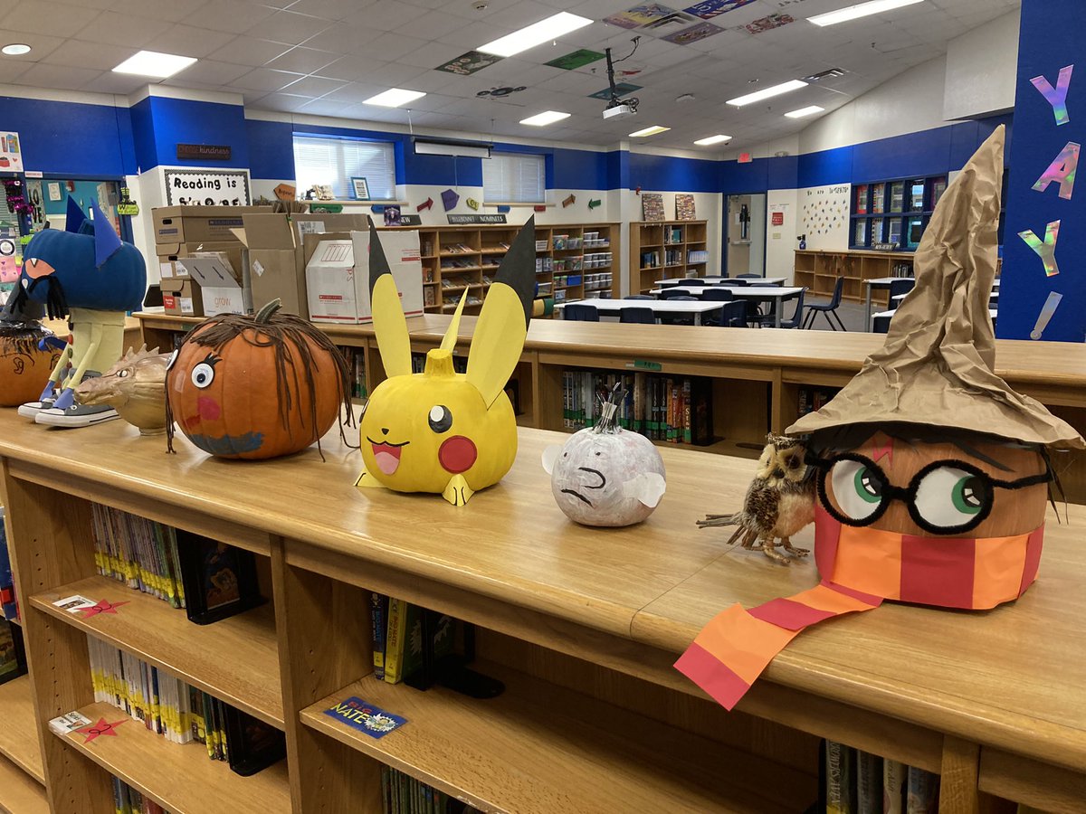MizDodson's tweet photo. I looooooooove the Book Character Pumpkins that @BluebonnetES students have brought in this month! #lisdlib https://t.co/OwLnTgopMy