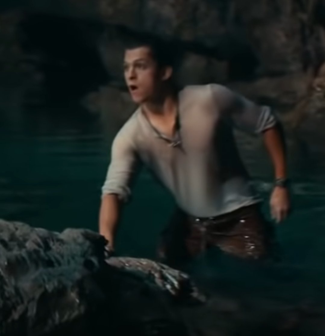 Nathan Drake from the trailer of the film, emerging from the water with his shirt hideously 100% tucked in.