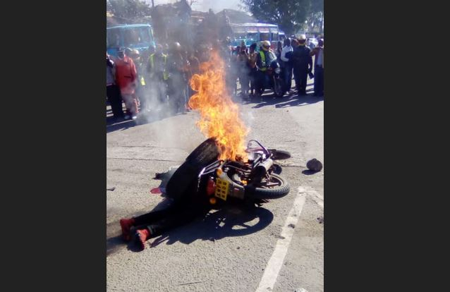 Two bodaboda riders were today, burnt to death by irate residents of Buruburu estate, Nairobi, after they allegedly grabbed a phone from a pedestrian along the busy Jogoo Road.
