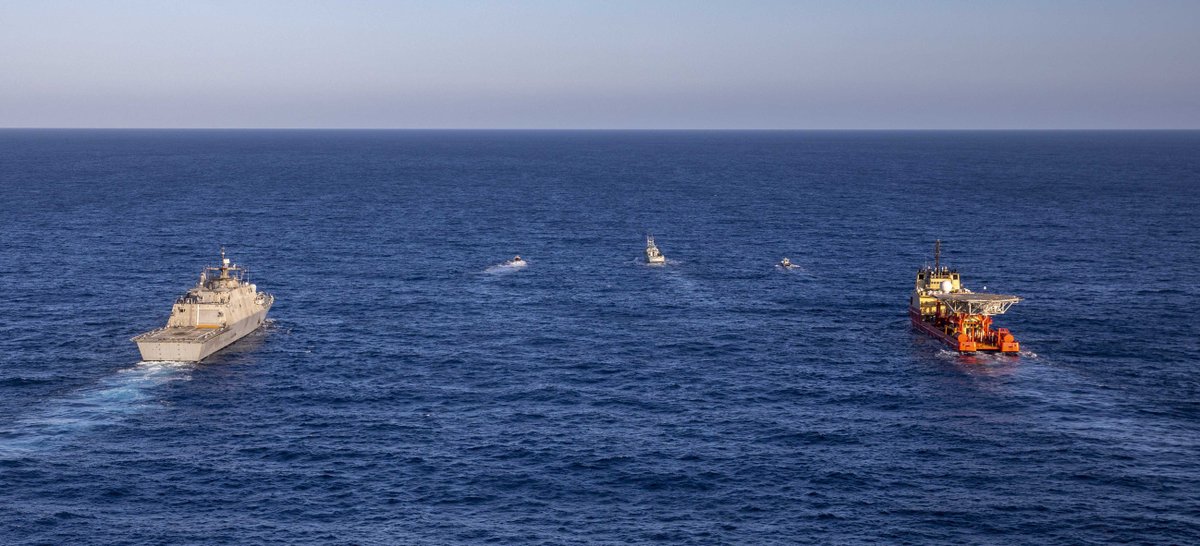 USNavy's tweet photo. Freedom-variant littoral combat ship #USSBillings , and the special mission support U.S Motor Vessel Kellie Chouest participate in a group sail with the Dominican navy following an intercept exercise, Oct. 24, 2021.  #NavyPartnerships 

More details ➡ https://t.co/v9cO0nAlSb https://t.co/B1EXRHTafQ