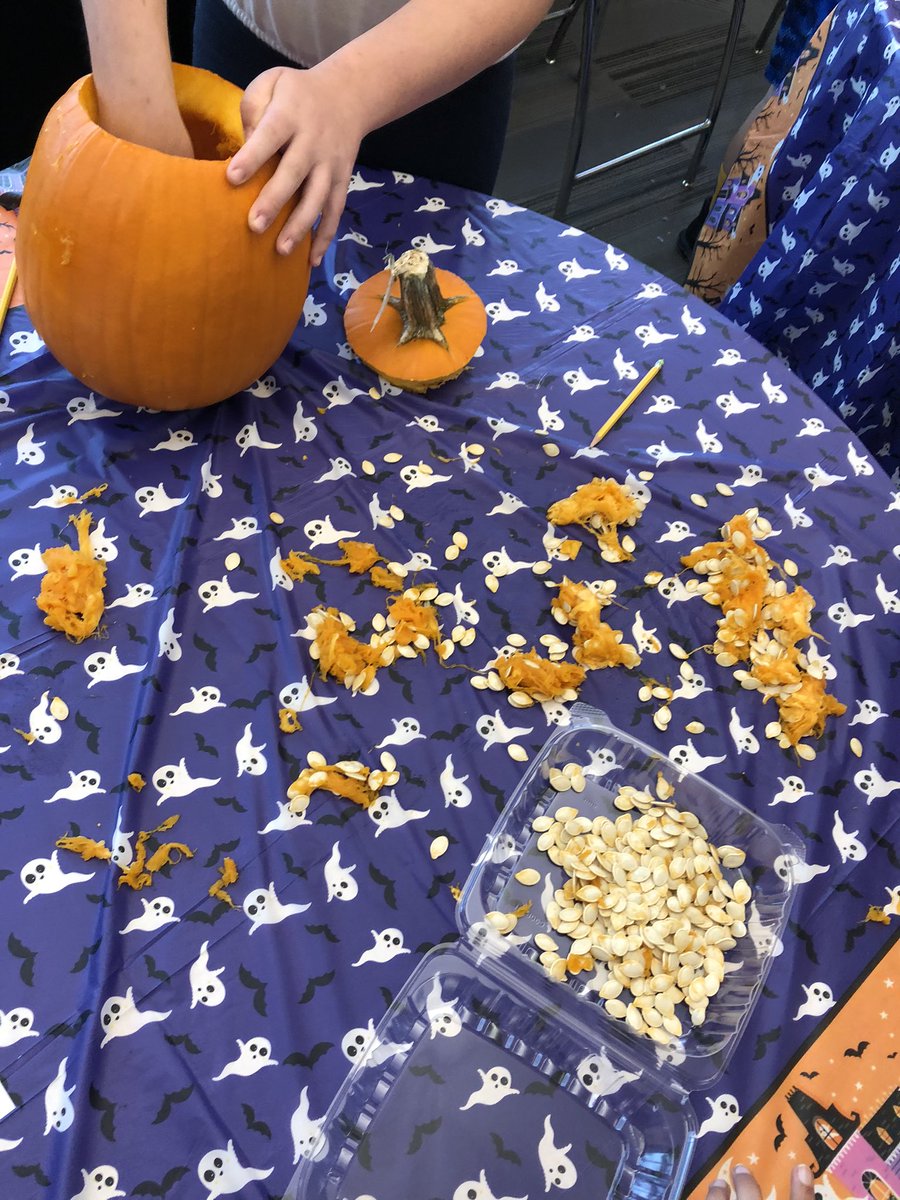 We are doing some estimating with pumpkin seeds! #halloween #messy
