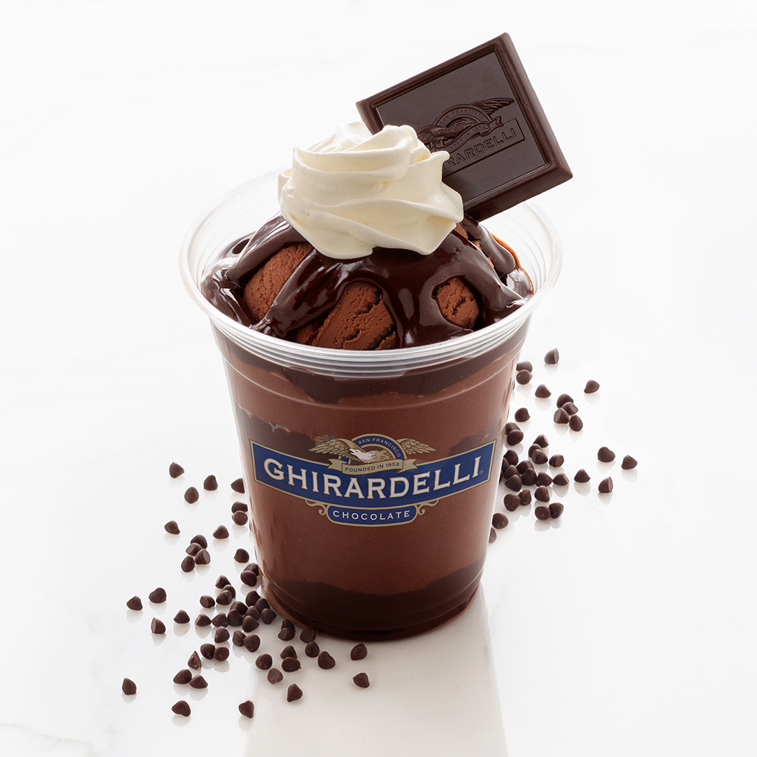 Treat yourself to an extra chocolatey dessert at Ghirardelli Ice Cream &amp; Chocolate Shop! 🍫 The Midnight Reverie Sundae starts with Chocolate Ice Cream layered with handmade Hot Fudge and Dark Chocolate Chips topped with whipped cream and an Intense Dark Square.🤤 #DisneySprings