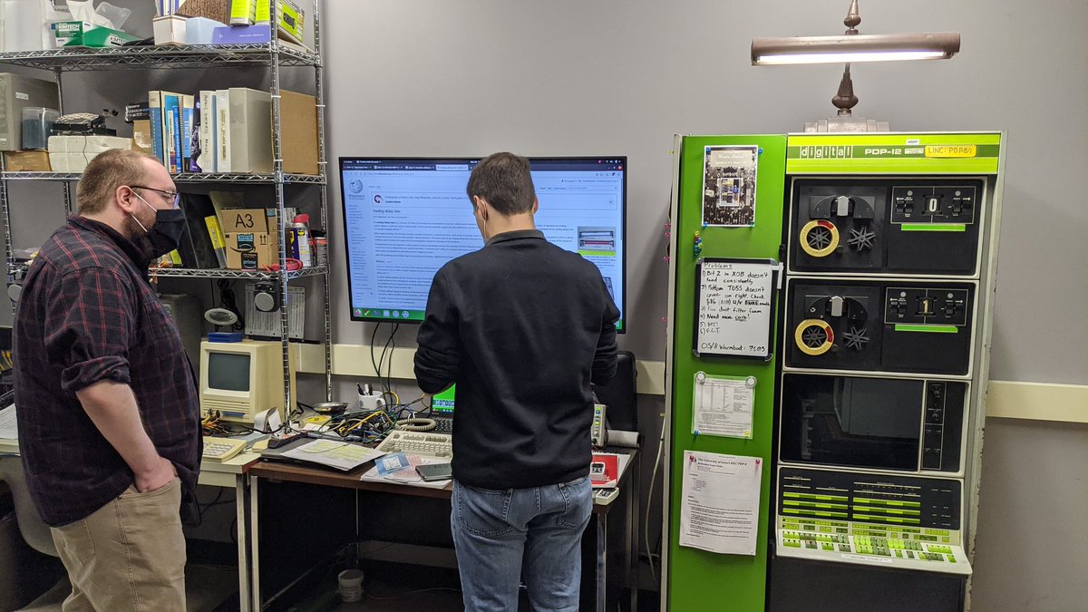 tastytronic's tweet photo. The program on the whiteboard loads the contents from the right switches into the accumulator and then into the extended operations buffer and back, allowing us to manually set and unset bits in the XOB. LINC mode. #PDP12 #vintagecomputing #retrocomputing #DEC #UMDPDP12 https://t.co/6WDoqOSaAx