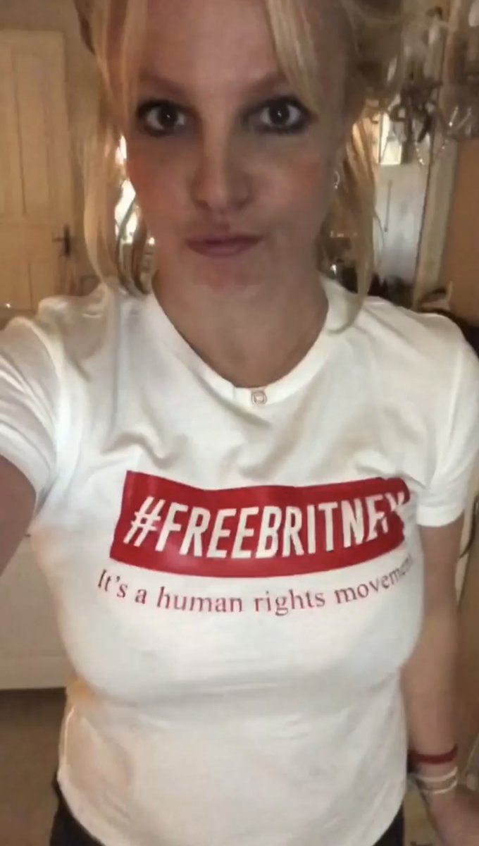 PopCrave's tweet photo. Britney Spears wears a #FreeBritney shirt ahead of today’s court hearing where her conservatorship is expected to be terminated after nearly 14 years. https://t.co/o5d5c4B2cQ