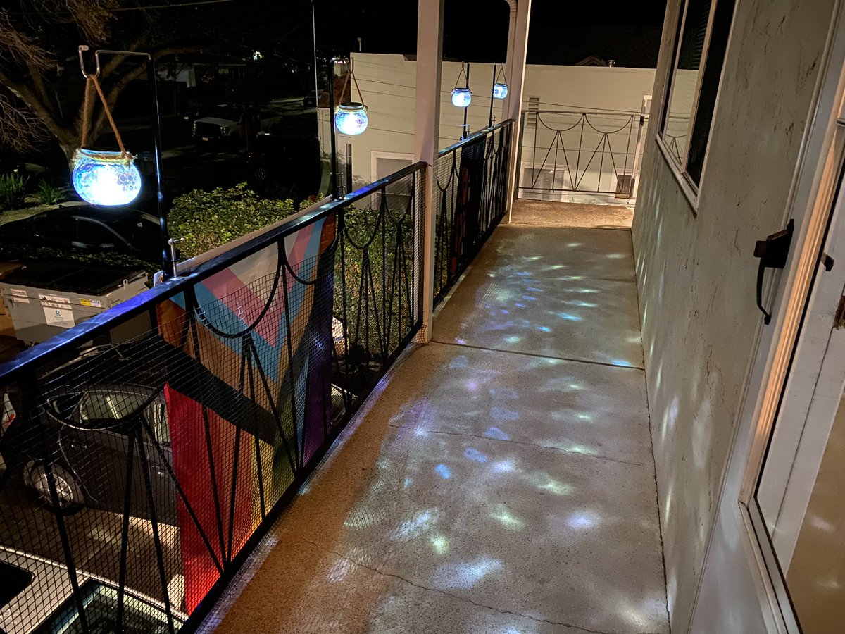 CuppaObscuritea's tweet photo. I may switch out the ‘born this way’ flag with my battle axe lesbian flag when I find it since the born one is a bit faded. But yaaaaasssss need/wanted moar sparkly rainbow lights for my part of the walkway. XD #newapartment #newapartmentdecor #pride #pride🌈 #pridedecor https://t.co/166xK6De7i