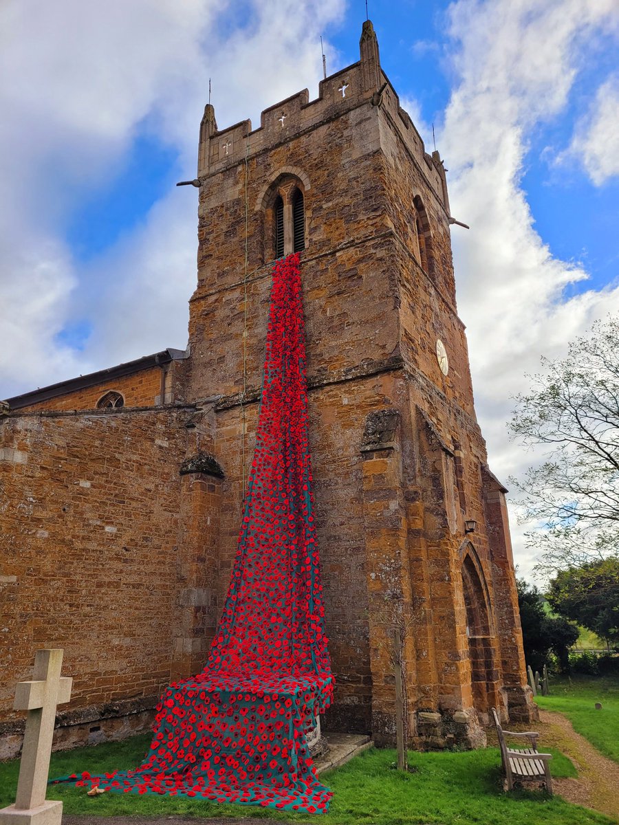kathryncroker's tweet photo. A beautiful Poppy Cascade at All Saints' Church in Rushton, Northamptonshire. Around 4000 poppies knitted, crocheted and made by the village community and individually sewn on by my mum Anne and her friend Amanda, who created this lovely tribute for Remembrance. Amazing ❤ https://t.co/adHXBY79fF