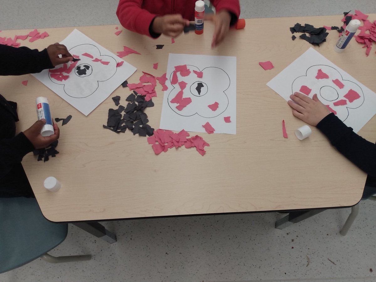 Making rip art poppies in kindergarten while talking about why they are important. @Gomes__Martins <a href="/StGregoryHCDSB/">St. Gregory</a> #thestgregoryway