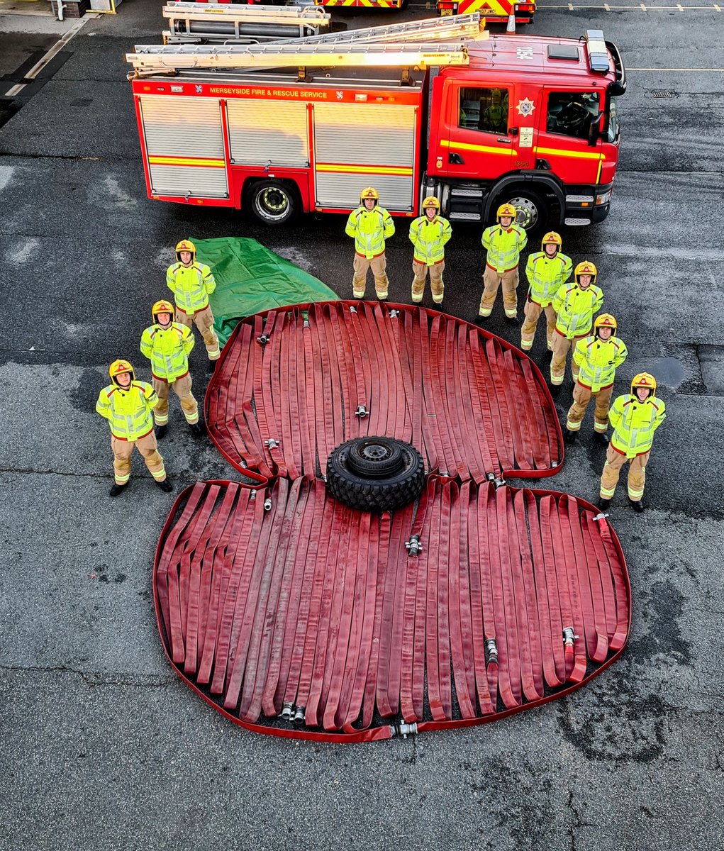 MerseyFire's tweet photo. Today at 11am, @MerseyFire staff will pause for 2 minutes to remember all those who have given the ultimate sacrifice for us. 

Here's a tribute from members of recruit course 03/21 &amp; Croxteth Fire Cadets - poppies made out of kit used by crews.

#LestWeForget #ArmisticeDay https://t.co/wUyyyiuzmJ