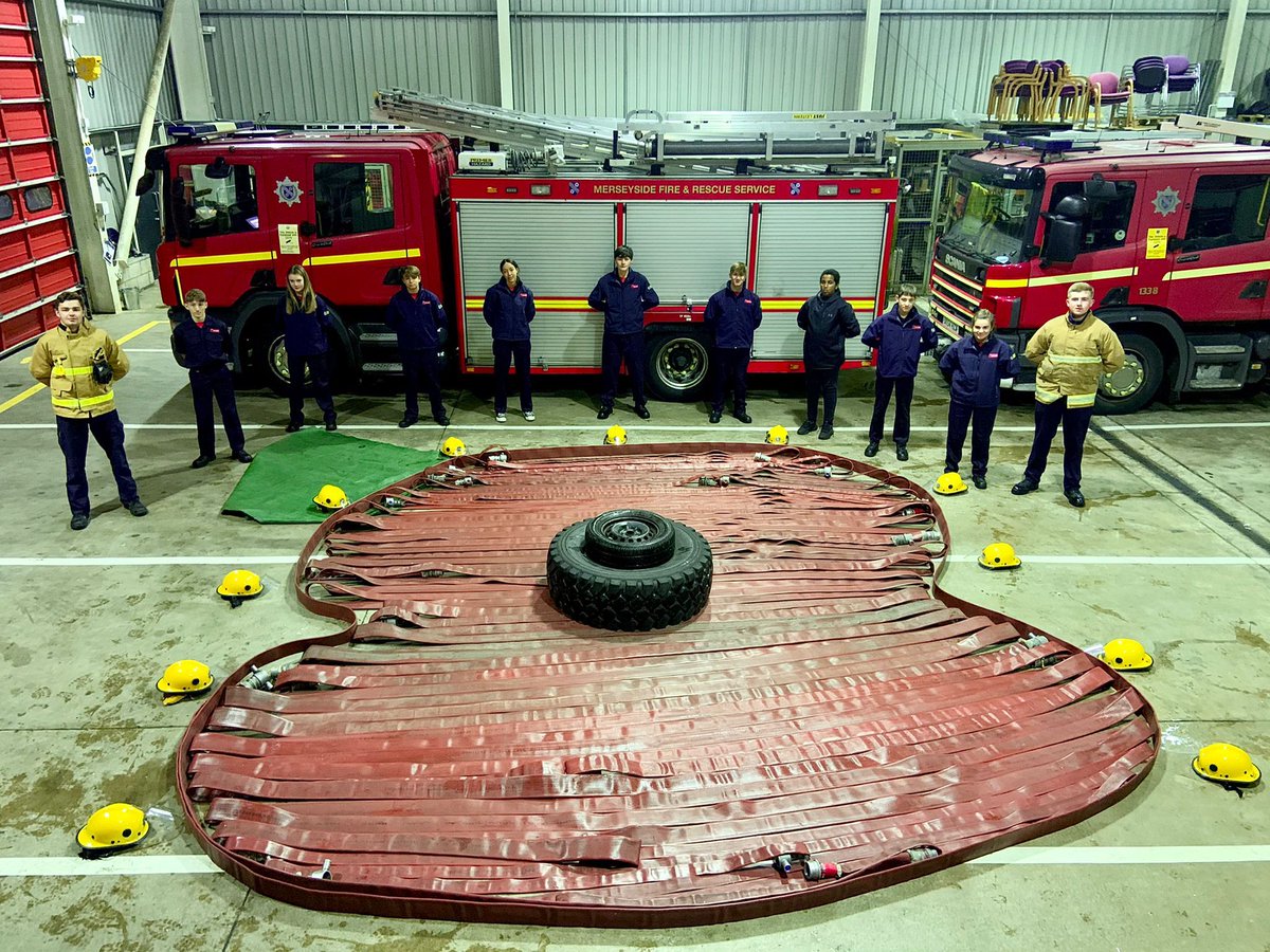 MerseyFire's tweet photo. Today at 11am, @MerseyFire staff will pause for 2 minutes to remember all those who have given the ultimate sacrifice for us. 

Here's a tribute from members of recruit course 03/21 &amp; Croxteth Fire Cadets - poppies made out of kit used by crews.

#LestWeForget #ArmisticeDay https://t.co/wUyyyiuzmJ