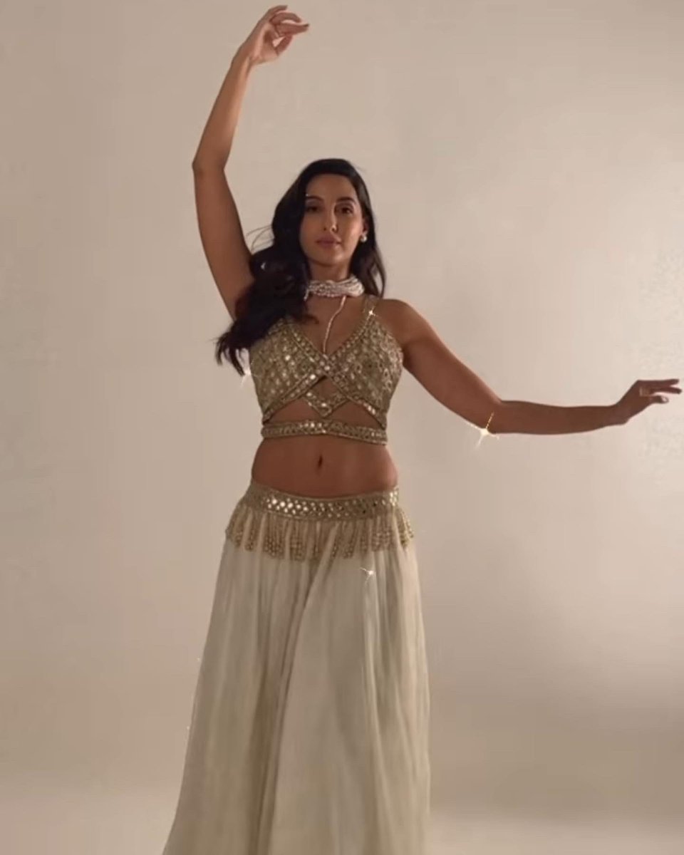 filmfare's tweet photo. The ever glamorous #NoraFatehi never fails to set the internet on fire. 🔥 https://t.co/51XN2BT2vX