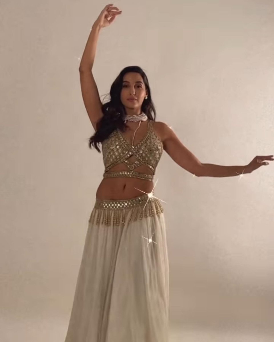 filmfare's tweet photo. The ever glamorous #NoraFatehi never fails to set the internet on fire. 🔥 https://t.co/51XN2BT2vX