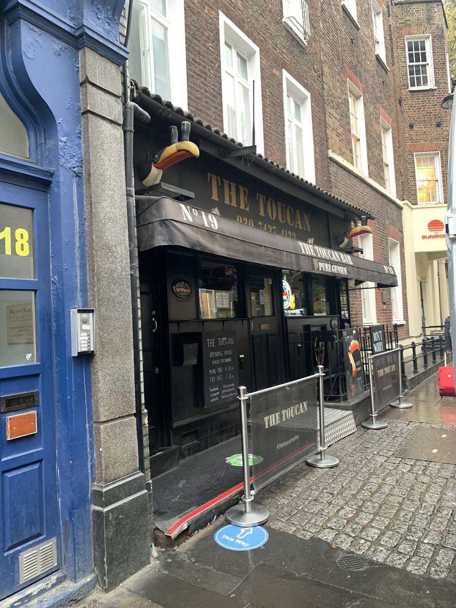 adamroberts__'s tweet photo. Working on a job in Soho and you can imagine my delight when I discovered The Toucan from @lastnightinsoho is a real place! 

A shame it isn’t open yet! And that there’s a huge white van in front of it. 

“Pint of numbers please”. @edgarwright https://t.co/xCtPQD5PRH