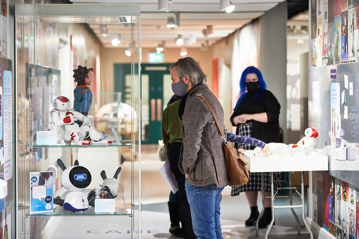Visitors take in the 'Can robots care?' exhibition at the Thackray Museum of Medicine.