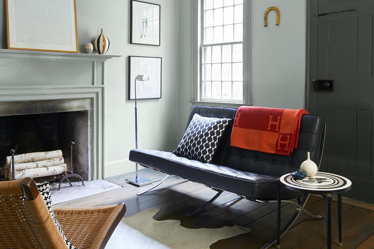 Try a cool neutral like Silver Marlin 2139-50 in different sheens, eggshell on the walls and semi-gloss on the mantle. The ceiling is done in White Diamond OC-61, and the door is decked out in Amherst Gray HC-167. Reach out to us for your next paint... sluri.us/j6c74p2lm