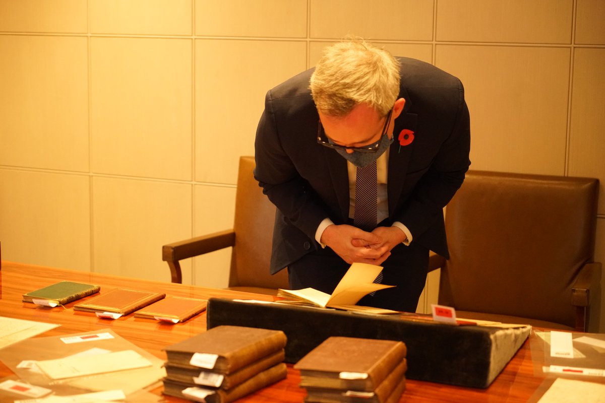 DCMS's tweet photo. A unique assembly of work from some of the UK’s favourite literary talent such as the Bronte sisters 📖

Lords Minister browses the impressive Honresfield collection today at @Sothebys 

#SaveTheHonresfieldLibrary | #Bronte https://t.co/tfd1KKLXw9