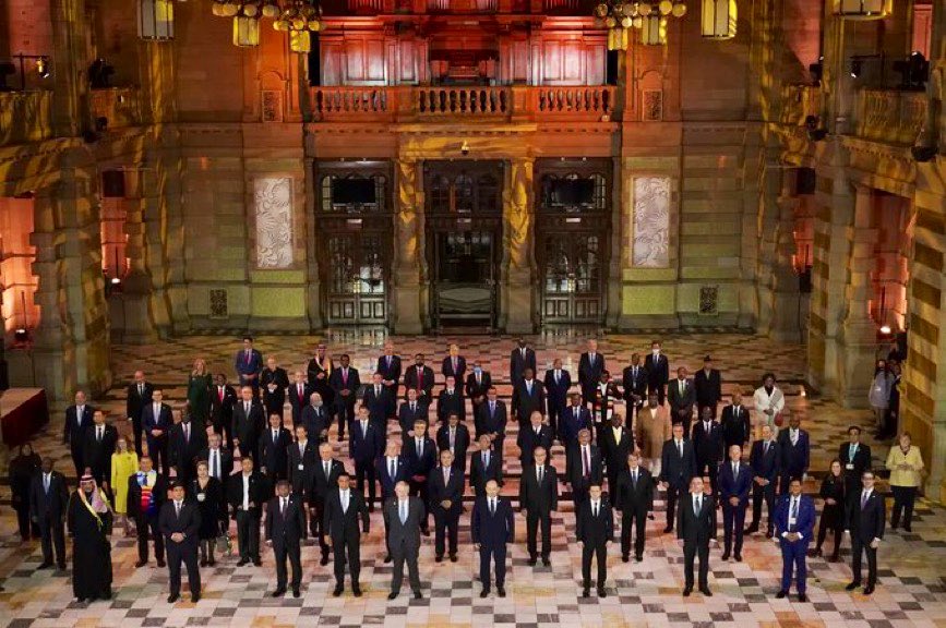 cathmckenna's tweet photo. Imagine if world leaders looked more like the photo on the left of #WomenLeadingOnClimate than that the #COP26 family photo on the right. We need to empower more women if we are going to meet the goals of the Paris Agreement including 1.5 degrees. #ActOnTheGAP https://t.co/VMPn8RMOgE