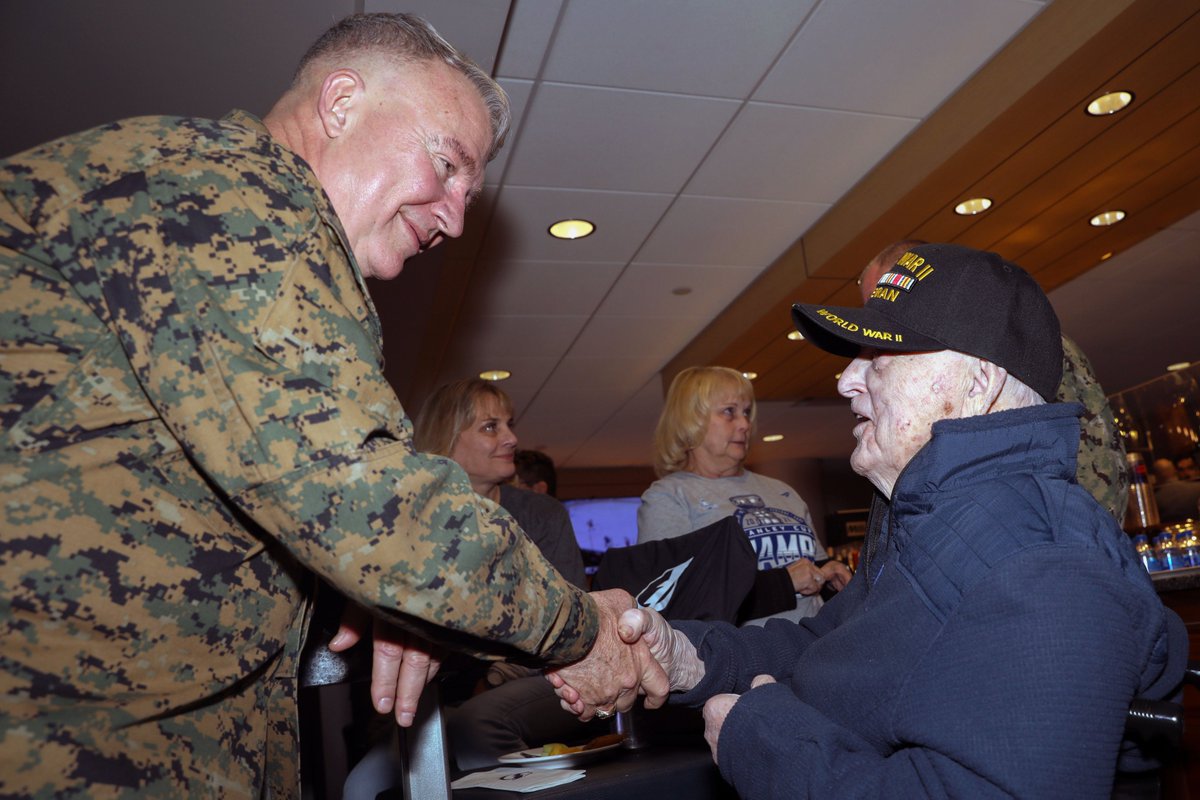 CENTCOM's tweet image. Gen. Frank McKenzie #CENTCOMCDR dropped the ceremonial first puck, read the oath of enlistment to new Marines, and met with local veterans during Military Appreciation Night at Amalie Arena last night. Thank you @TBLightning ⚡️ #VeteransDay