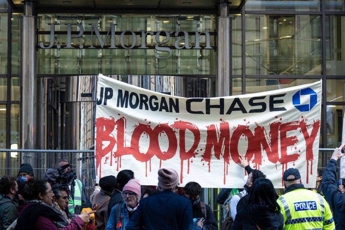 IENearth's tweet photo. Earlier today Indigenous leaders at the #COP26 held an action outside the @jpmorgan @Chase bank in Glasgow, UK calling out the bank for its role as the largest financier of fossil fuels worldwide! #DivestFromFossilFuels #NoTarSands https://t.co/foqviUDfLA