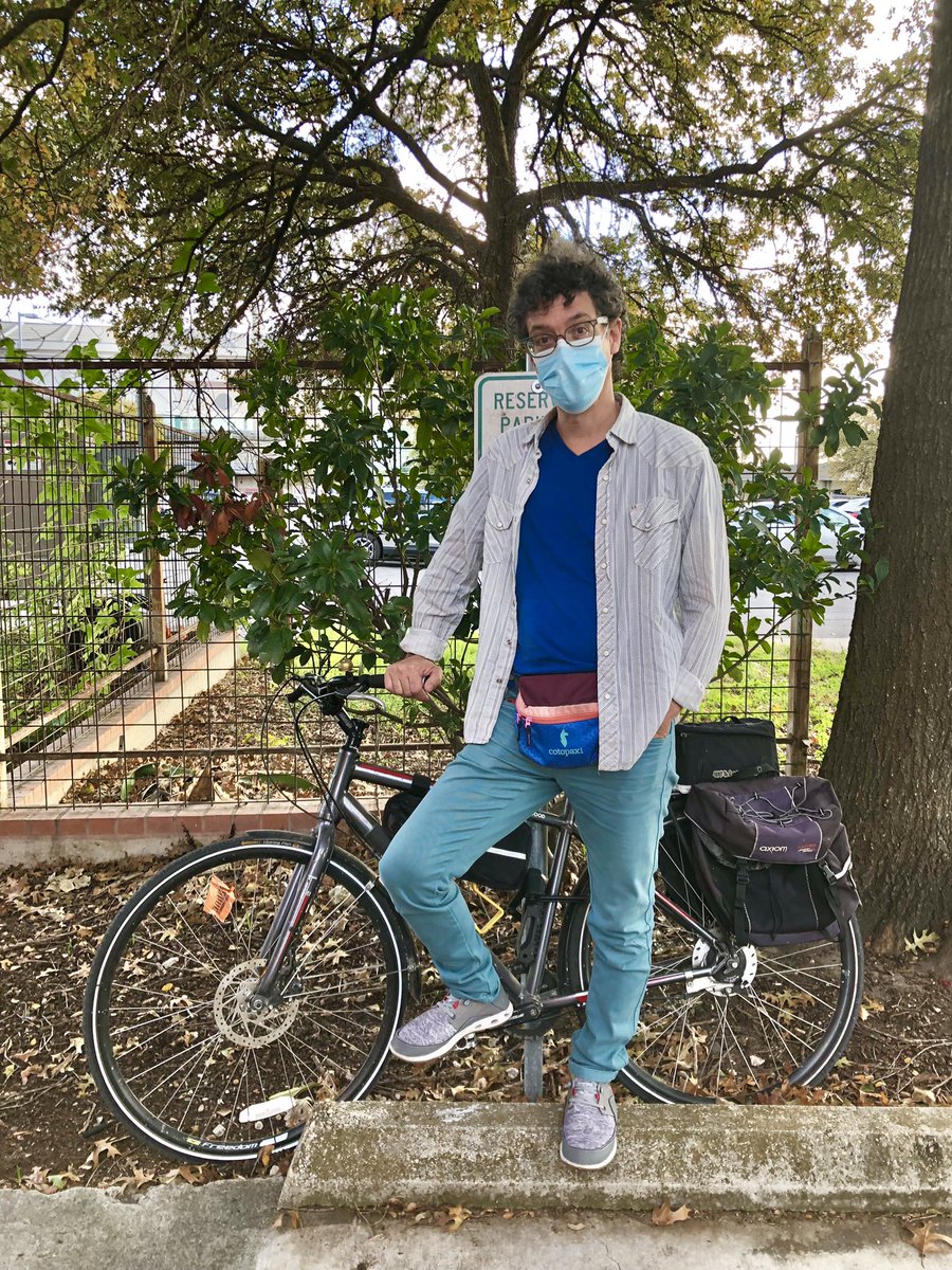 whatisnicholas's tweet photo. Nicholas is wearing a “casual open shirt look” with a thrifted button down of very soft cotton and pearl snaps, @mackweldon T-shirt, @patagonia Work Wear pants, @Walgreens socks, @Columbia1938 river shoes, @cotopaxi fanny pack, and a Dr. Good bike from @konaworld. https://t.co/Vxrau1WV9L