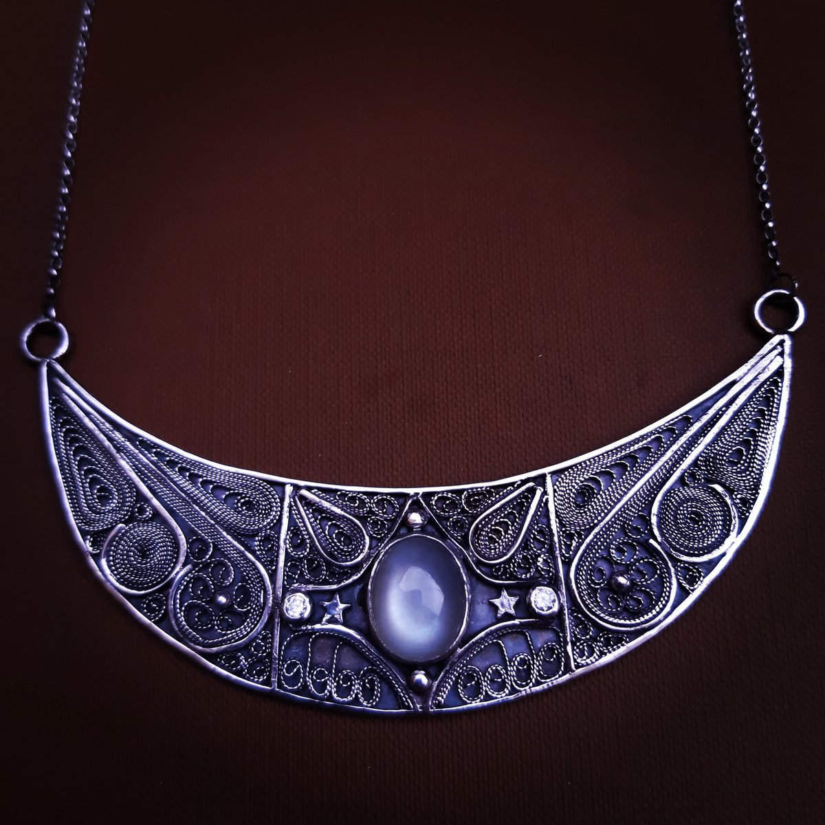 MarkBorg20's tweet photo. When the moon and stars align.. galaxies and comets will dance.. in this pendant, the secret of the universe lies. #Malta #maltese #filigree #pendnat #moonstone #jewelersofinstagram #jeweller #handcrafted #handmadejewelry #handmade #handmademalta https://t.co/TXsgit95kj