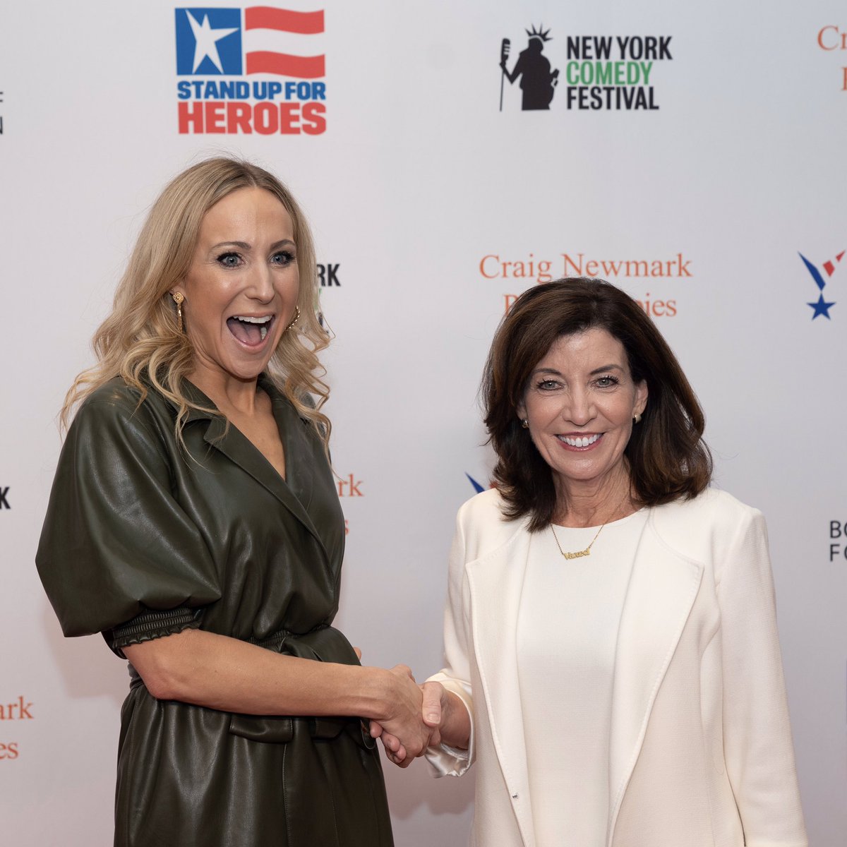 Governor Hochul shakes hands with Nikki Glaser