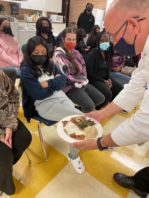 CTE_HuntHS's tweet photo. Chef Bishop from @wccwilsonnc treated Mrs. Boykin's Foods I and II students to a cooking demonstration in our newly remodeled kitchen. He displays and explains his plate presentation below. #HappyCareerDevelopmentMonth @WilsonSchoolsNC @Hunt_High_NC @CTEforNC https://t.co/6inHFlq2Ah