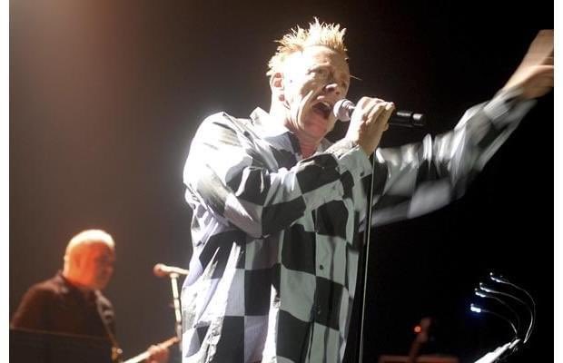 KrKarenKr's tweet photo. Disappointed in myself for not guessing #JesterMask . Been a huge Sex Pistols fan since 1980. #TheMaskedSinger Here's a photo when I saw him in Montreal in 2010. https://t.co/0L9oQNQa2s