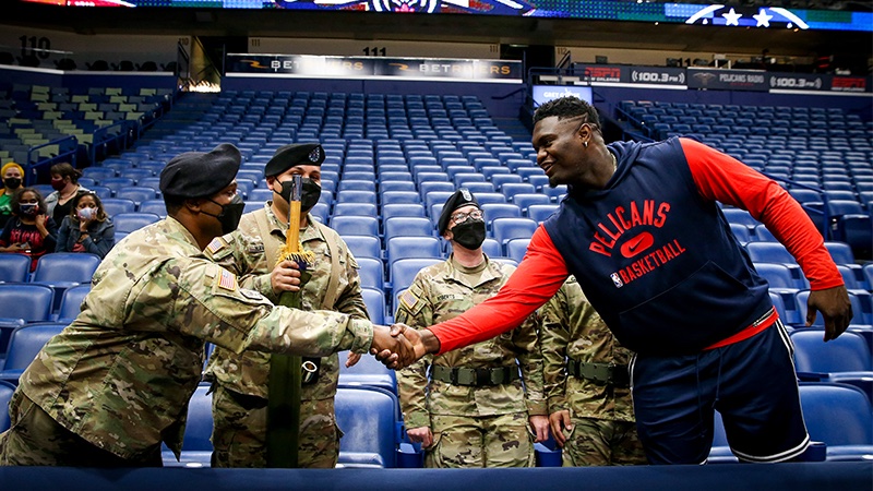PelicansNBA's tweet photo. A #HoopsForTroops jersey swap 🏀

@ZionWilliamson | #VeteransDay https://t.co/dunsOjKlrB