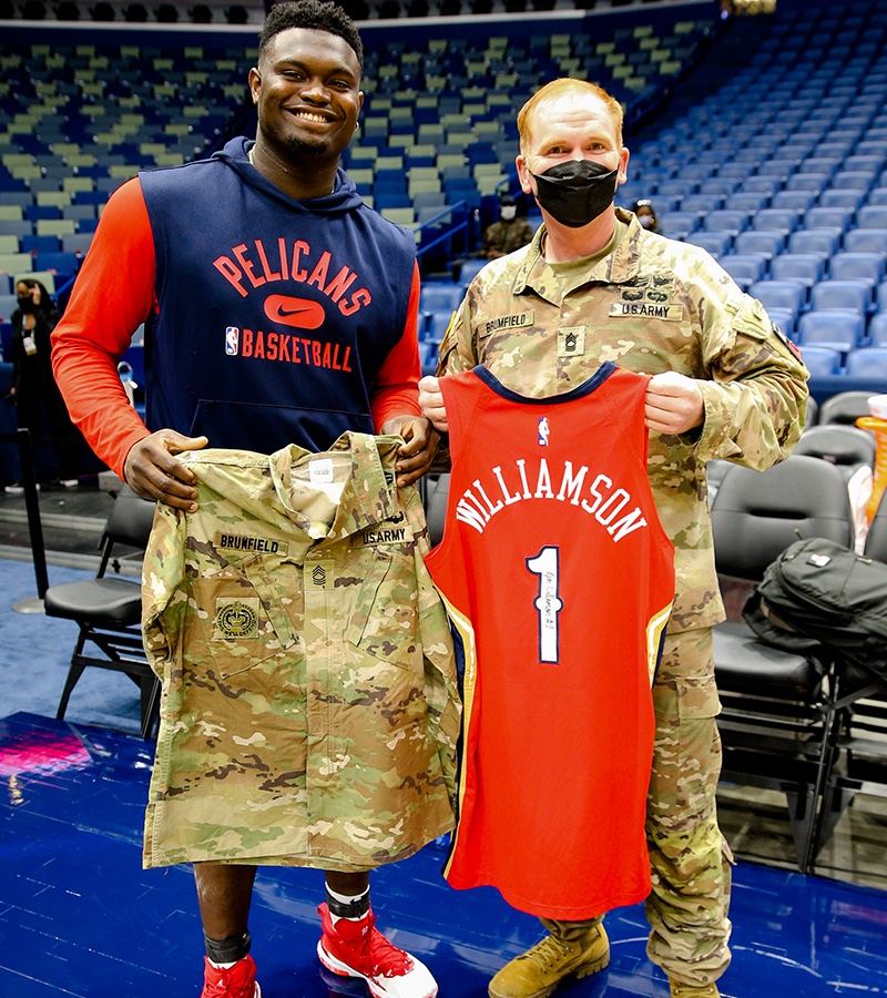 PelicansNBA's tweet photo. A #HoopsForTroops jersey swap 🏀

@ZionWilliamson | #VeteransDay https://t.co/dunsOjKlrB
