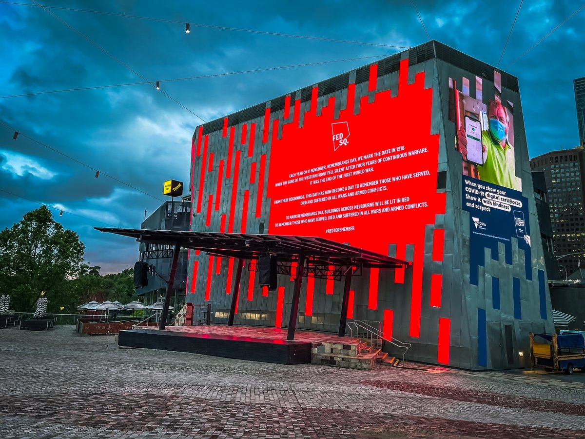 FedSquare's tweet photo. Tonight, from 6pm–8pm, Fed Square is lit #redtoremember for #RemembranceDay21. We acknowledge all those who have served our country in wars and on peace-keeping missions, and remember those who have died in battle. #lestweforget https://t.co/D93XwbnDr2