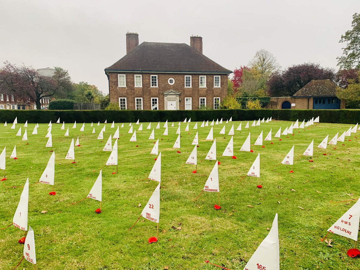 PrincipalBSM's tweet photo. Armistice Day - @RHSSuffolk #RemembranceDay2021 #LestWeForget Our community remembers and this year the lawns are covered with sails representing the ships and lives lost. https://t.co/daB6jfqTYk
