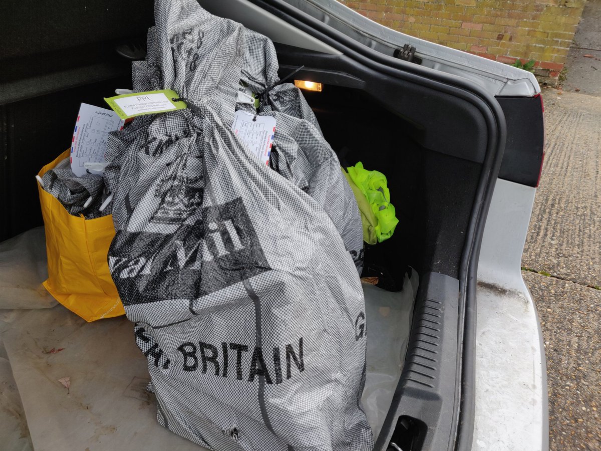 Post bags in a car boot