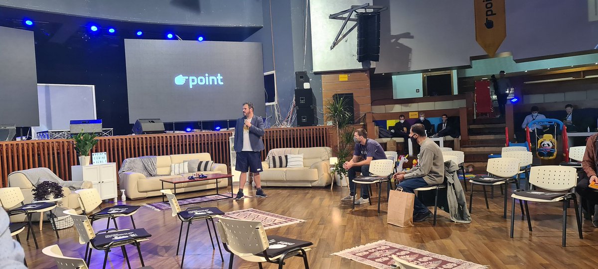 mschenk's tweet photo. Cool concept for #point90 conference. The hall is set up like a living room, to ease the transition from virtual conferences during the lockdowns :-)
There are couches and they even provided blankets in the goodie bag. https://t.co/IDnbPIfvxd