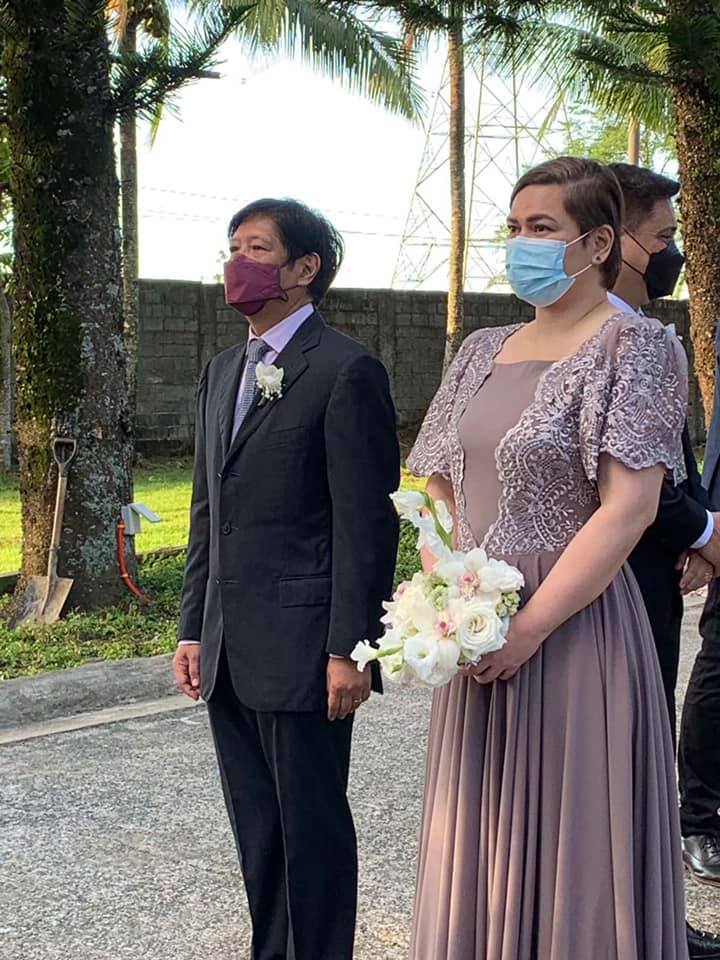 newswatchplusph's tweet photo. LOOK: Davao City Mayor Sara Duterte and presidential aspirant Bongbong Marcos attend the wedding of Senator Bong Revilla’s daughter, Gianna.

Their meet up comes amid the speculation the two will form a tandem for the 2022 elections. | @RexRemitio https://t.co/bdilCuladq