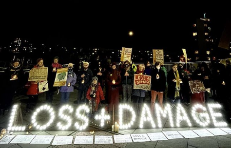 CANIntl's tweet photo. Last night's vigil calling for #LossandDamage finance after a weak #COP26 draft cover decision text which "acknowledged" L&amp;D but no commitment or mechanism to fund it

Ask world leaders to #PayUp4LossandDamage now: https://t.co/pzqsbpwwk2 https://t.co/YZ742ZIGIO