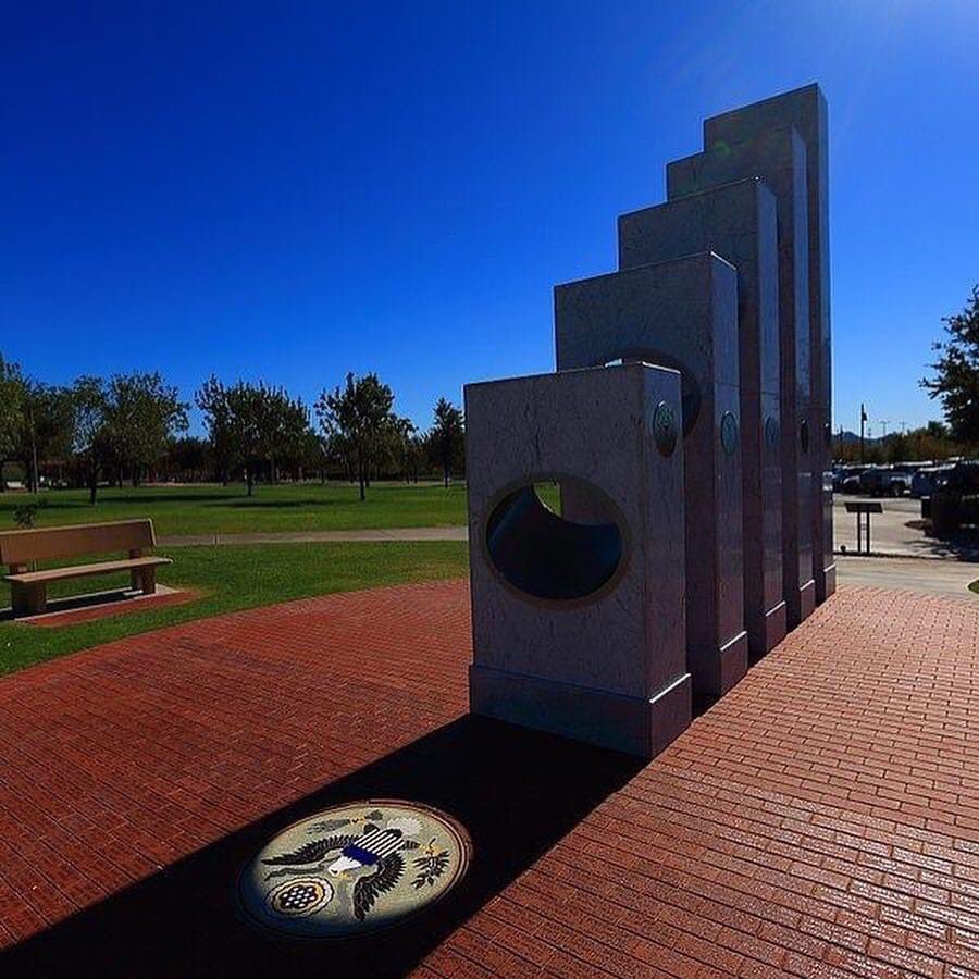 steve_carlson17's tweet photo. At 11:11 a.m Veterans Day the sun’s rays pass through the ellipses of the five Armed Services pillars to form a perfect solar spotlight over a mosaic of The Great Seal of the United States.  Thank you veterans, today we honor you! #hansonbrothers #veteransday #puttingonthefoil https://t.co/UV8oV2Tx7b