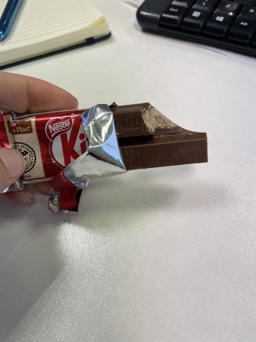 DeanJeannette's tweet photo. @Nestle how I opened my kitkat. So much for have a break. It’ll be a few seconds letter now. So disappointed. https://t.co/5DZlk6bDnc