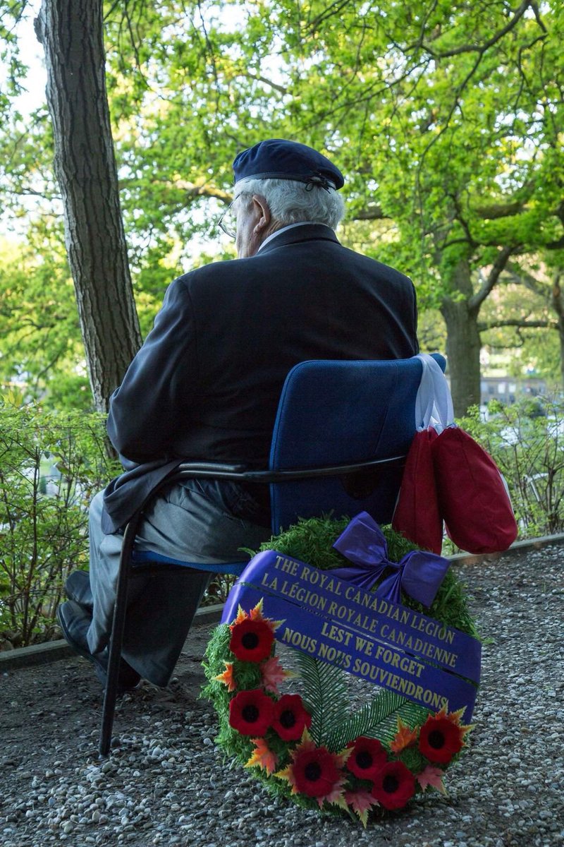 gladshockey's tweet photo. A day of reflection, gratitude, respect, and thanks. My grandfather  Dr Roly Armitage paying respect at Beny-Sur-Mer Cemetery to his Lt. Roy Pattinson in the 3rd Med. Royal Cdn. Artillery who lost his life fighting for our freedom.  #LestWeForget #RemembranceDay https://t.co/WVoroEolTq