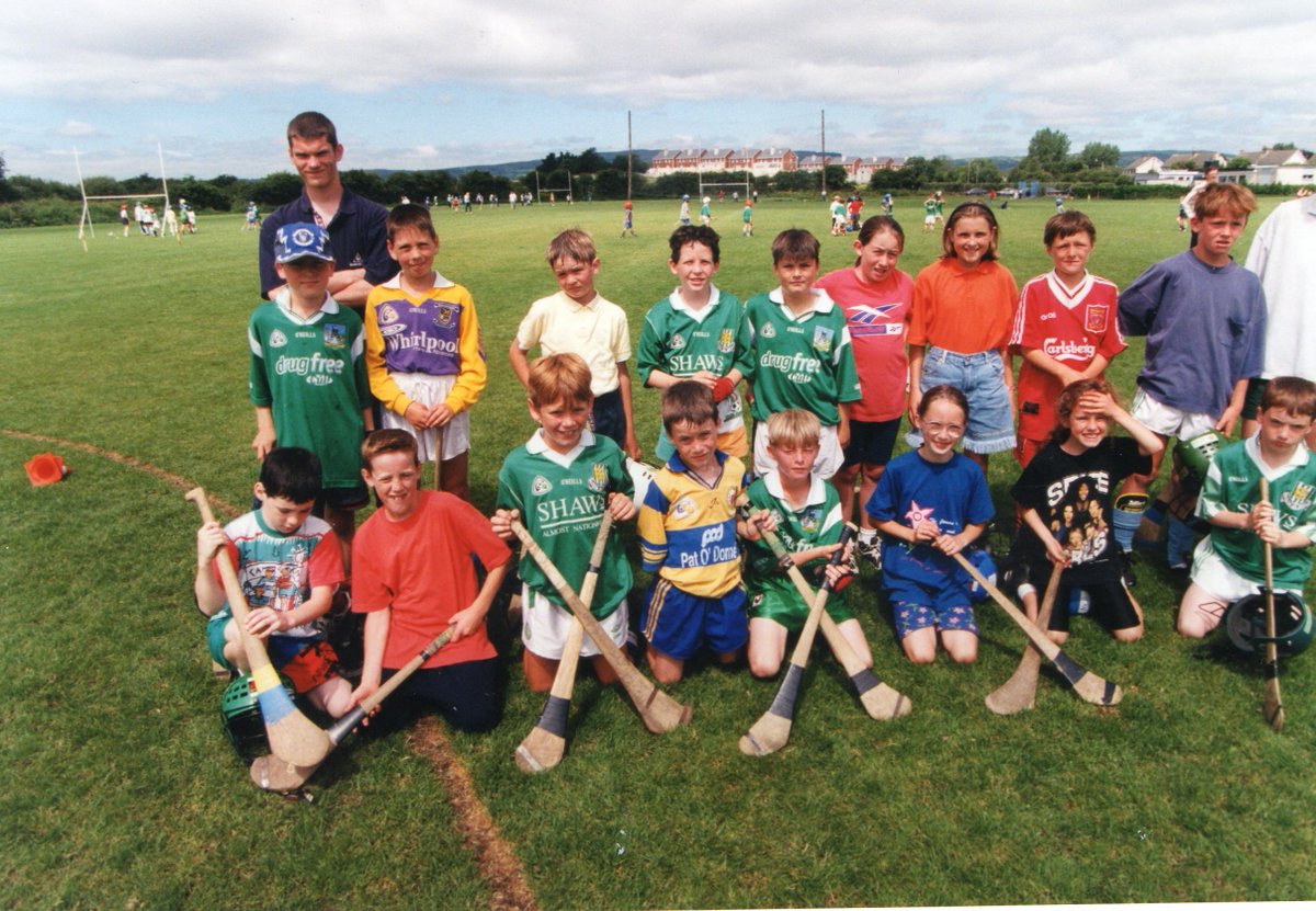 LimerickGAAzine's tweet photo. Summer camp at Na Piarsaigh about 20 years ago. Lots of retro @limerick jerseys! Here's where the stars of tomorrow learn the skills of the game @NapGAA @LimCamogie @noellkgm https://t.co/KaP0p5ZbUE