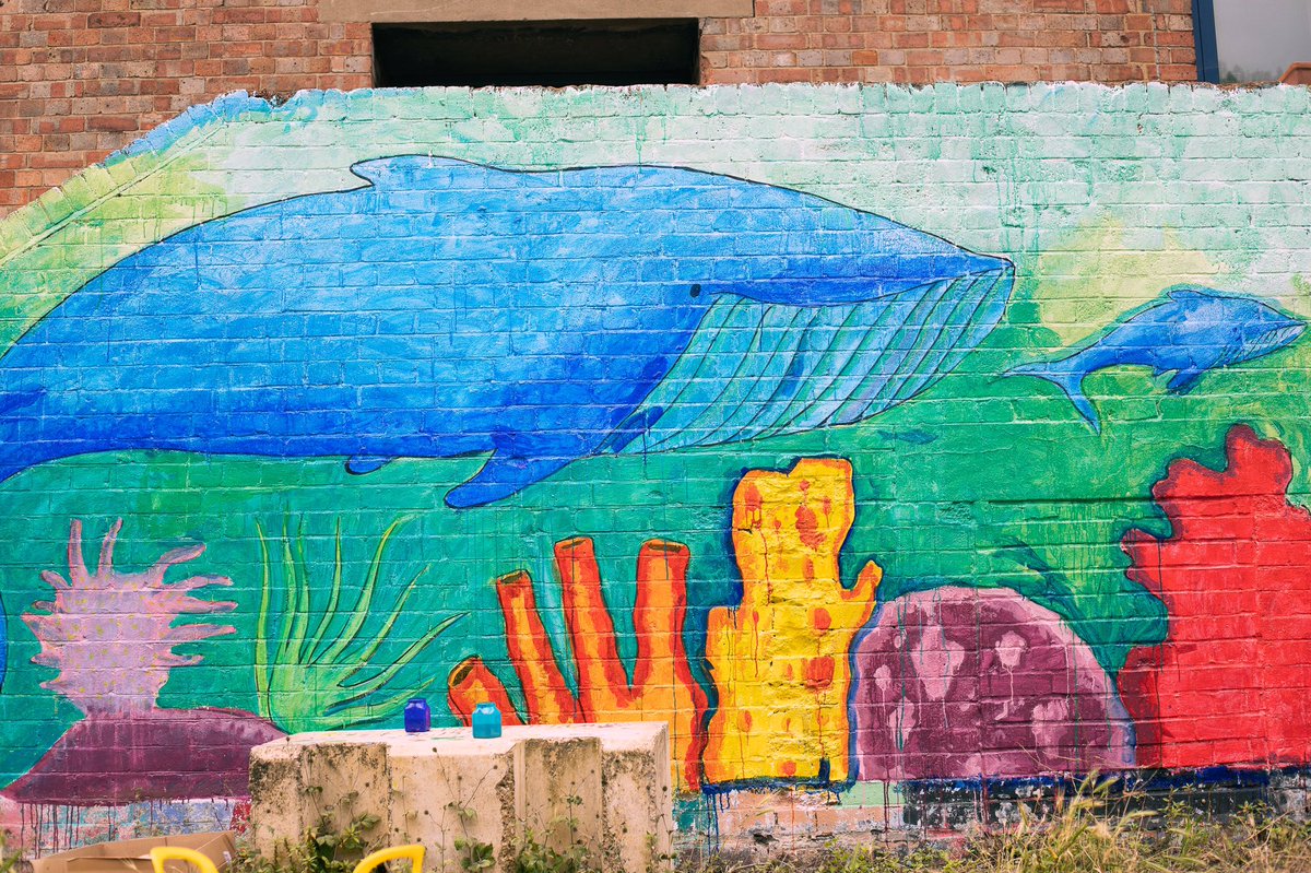FreshPaintNHM's tweet photo. As #COP26  draws to a close let’s look back at the climate change themed murals young people from Newham painted this summer, expressing both their hopes and fears for the future. https://t.co/IXx6erH1iV