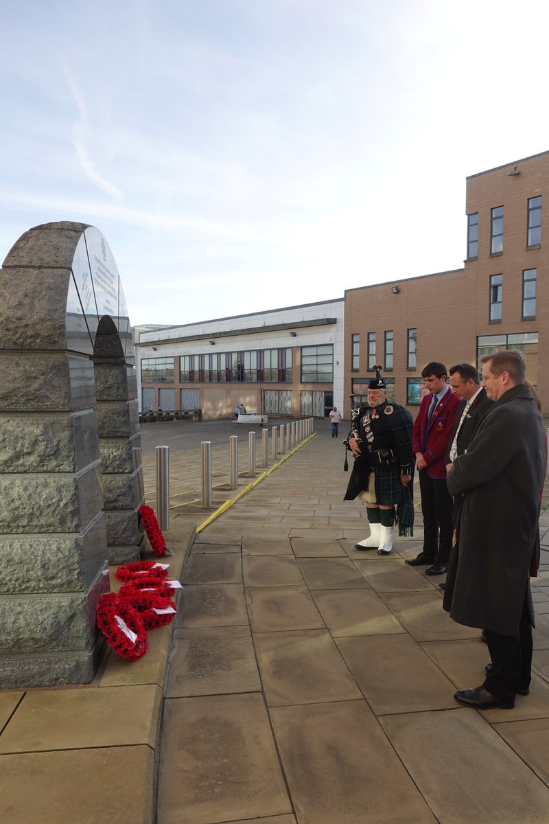 HC_Scotland's tweet photo. Headteacher Mr Charman, Head Girl Heather and Head Boy Luke visited the War Memorial in Hamilton this morning, to mark Remembrance Day by paying their respects and remembering those lost in conflict.

#HamiltonReflection https://t.co/exwaX8bKnr