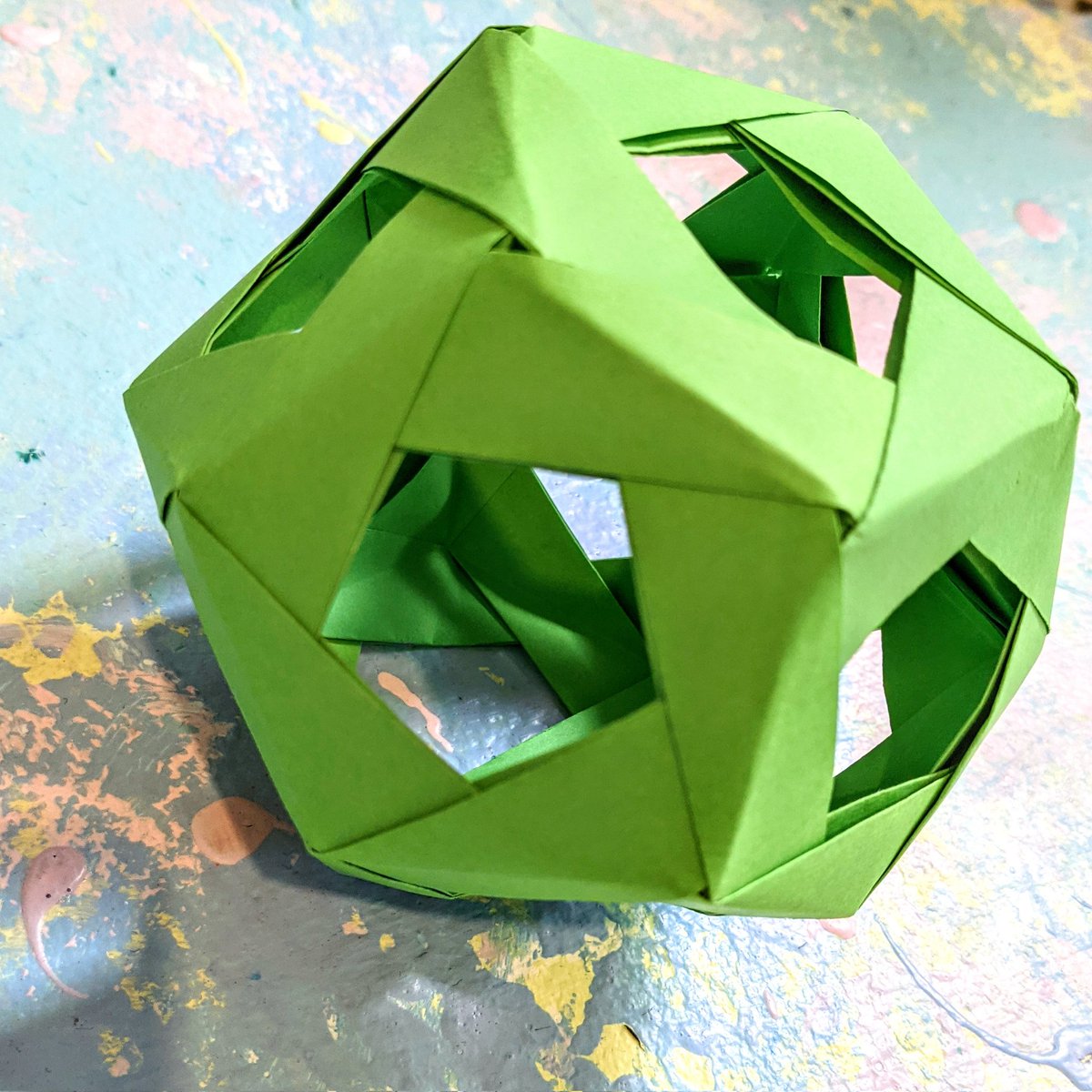 GemmaEllen's tweet photo. You know how it's important to know when something is taking up too much time and isn't worth it? I don't have that ability but I do have an origami dodecahedron! #origami https://t.co/UPaFpLm5ru