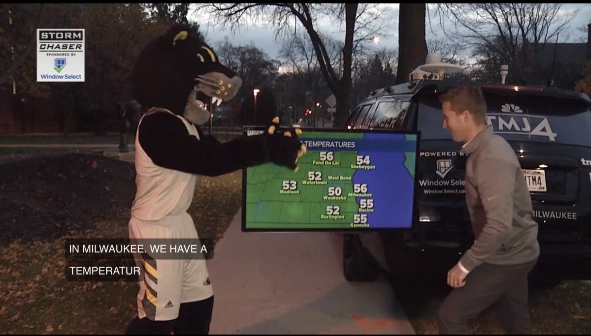 SusanKim4's tweet photo. .⁦@PouncePanther⁩ helping @brianNizTMJ4 with the weather. 

Is there anything better?! 

⁦@tmj4⁩ @uwm https://t.co/G8bT74JAGx