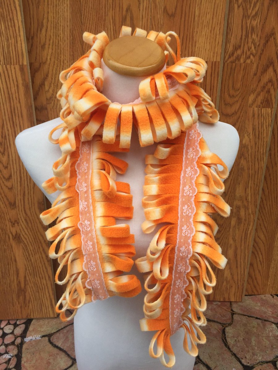 Looking for a #warmscarf? How about this #orange #fleecescarf it's soft & warm. $19.95 & #freeshipping too. #Treatyourself or buy ahead as #christmasgift. #OrangeBoaScarf #LadiesWarmScarf #Under20gift #LoopyScarf #ChunkyScarf #SisterGift #GiftforWife  etsy.me/3qtsYfq